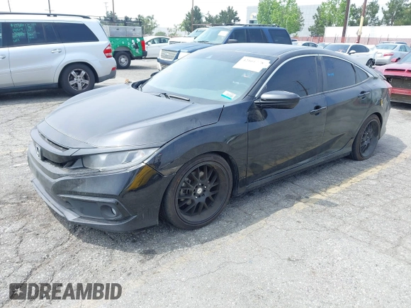 2021 Honda Civic Sport with VIN 2HGFC2F88MH557221, listed as a IAAI auction lot 42161778 with 101,956 mi miles and . Bid and sale history available at DreamBid. Image 2.