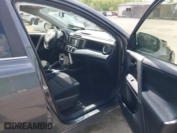 2015 Toyota RAV4 LE with VIN JTMBFREV2FD104409, listed as a IAAI auction lot 42084145 with 102,948 mi miles and . Bid and sale history available at DreamBid. Image 5.