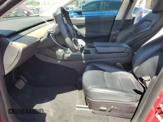 2021 Tesla Model Y Long Range with VIN 5YJYGDEE0MF217761, listed as a Copart auction lot 56525075 with 72,751 mi miles and Salvage Title. Bid and sale history available at DreamBid. Image 7.
