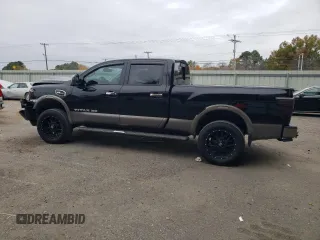 2017 Nissan Titan XD SL with VIN 1N6AA1F41HN548361, listed as a Copart auction lot 84654174 with 142,057 mi miles and Salvage Title. Bid and sale history available at carsss.com. Image 2.