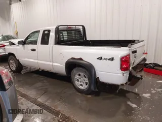 2006 Dodge Dakota z VIN 1D7HW22NX6S579197, wystawiony jako IAAI lot #41816797 z przebiegiem 223 900 mil mil oraz . Historia ofert i sprzedaży dostępna na DreamBid. Obrazek 3.