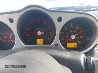 2004 Nissan 350Z Touring with VIN JN1AZ34E94T052137, listed as a IAAI auction lot 41939712 with 93,426 mi miles. Bid and sale history available at carsss.com. Image 7.