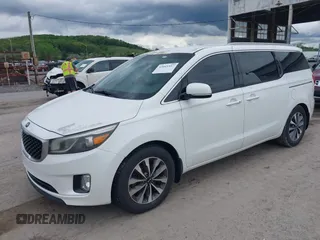2015 Kia Sedona EX with VIN KNDMC5C14F6019067, listed as a IAAI auction lot 42045357 with 149,736 mi miles. Bid and sale history available at carsss.com. Image 2.