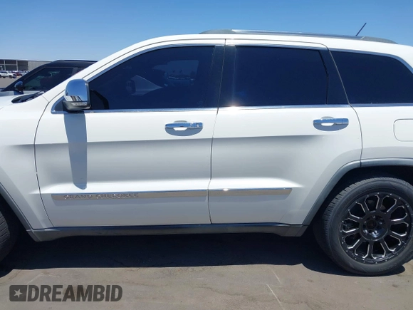 2011 Jeep Grand Cherokee Overland with VIN 1J4RR6GT2BC647589, listed as a IAAI auction lot 42603134 with 153,570 mi miles and . Bid and sale history available at DreamBid. Image 14.
