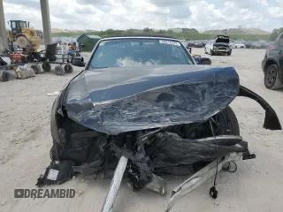 2014 Audi A5 Premium z VIN WAUCFAFH7EN009400, wystawiony jako Copart lot #58018325 z przebiegiem 65 010 mil mil oraz Szkoda całkowita • Salvage title. Historia ofert i sprzedaży dostępna na DreamBid. Obrazek 5.