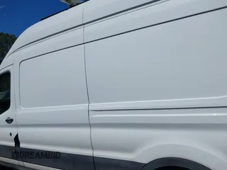2020 Ford Transit Cargo with VIN 1FTBR1X86LKB19969, listed as a IAAI auction lot 41844157 with 182,881 mi miles and . Bid and sale history available at DreamBid. Image 14.