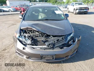 2012 Honda Civic EX-L with VIN 19XFB2F94CE303073, listed as a IAAI auction lot 42136841 with 102,905 mi miles and . Bid and sale history available at DreamBid. Image 12.