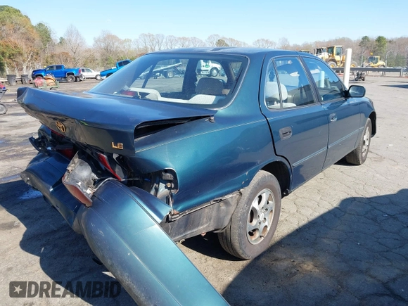 1996 Toyota Camry DX with VIN 4T1BG12K1TU688639, listed as a IAAI auction lot 41883160 with 264,542 mi miles. Bid and sale history available at carsss.com. Image 4.