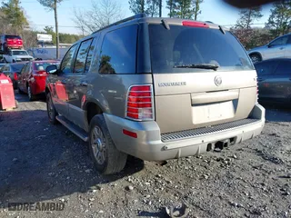 2003 Mercury Mountaineer Convenience with VIN 4M2DU66W93UJ19077, listed as a IAAI auction lot 41296559 with 164,143 mi miles. Bid and sale history available at carsss.com. Image 3.