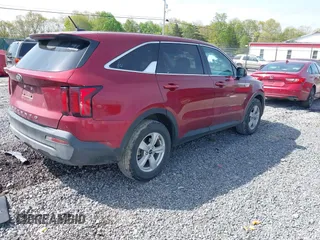 2021 Kia Sorento LX with VIN 5XYRG4LC1MG052981, listed as a IAAI auction lot 42199446 with 82,634 mi miles and . Bid and sale history available at DreamBid. Image 4.