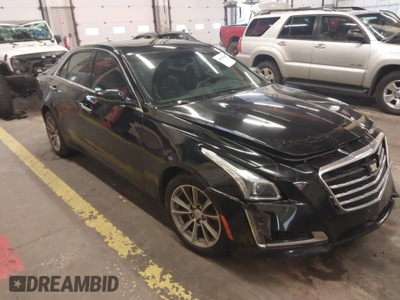 2019 Cadillac CTS Luxury AWD with VIN 1G6AX5SSXK0145788, listed as a IAAI auction lot 40898982 with 92,316 mi miles and . Bid and sale history available at DreamBid. Image 1.