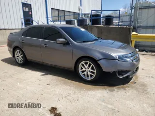 2012 Ford Fusion SEL with VIN 3FAHP0JG8CR217039, listed as a Copart auction lot 52078065 with 153,506 mi miles and Salvage Title. Bid and sale history available at carsss.com. Image 4.