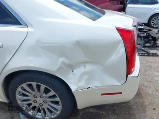 2012 Cadillac CTS Performance z VIN 1G6DK5E34C0116367, wystawiony jako IAAI lot #42373255 z przebiegiem 93 444 mil mil oraz . Historia ofert i sprzedaży dostępna na DreamBid. Obrazek 6.