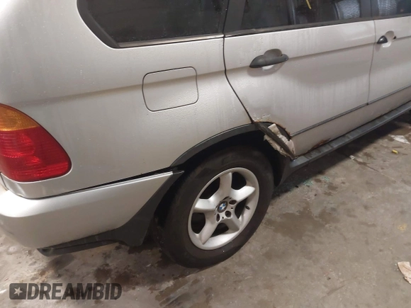 2001 BMW X5 3.0i with VIN WBAFA53571LM79025, listed as a IAAI auction lot 41183569 with 255,640 mi miles. Bid and sale history available at carsss.com. Image 12.