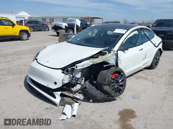2021 Tesla Model 3 Performance with VIN 5YJ3E1EC8MF044388, listed as a IAAI auction lot 41821892 with Not Provided miles and . Bid and sale history available at carsss.com. Image 2.