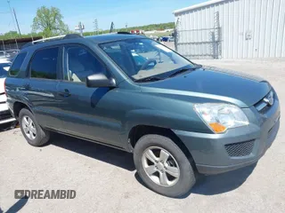 2009 Kia Sportage LX with VIN KNDJF724497602223, listed as a IAAI auction lot 42085415 with 91,105 mi miles. Bid and sale history available at carsss.com. Image 1.
