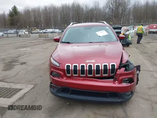 2015 Jeep Cherokee Latitude with VIN 1C4PJMCS6FW594812, listed as a IAAI auction lot 41709068 with 125,232 mi miles. Bid and sale history available at carsss.com. Image 12.