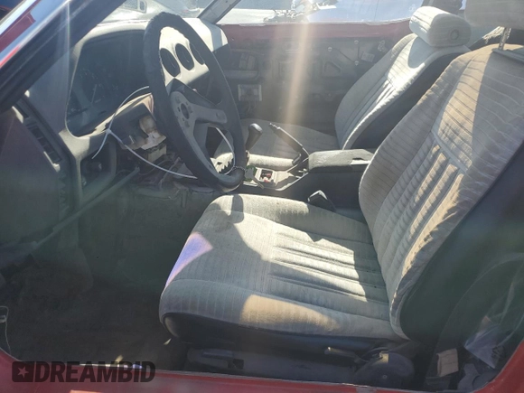 1983 Datsun 280ZX z VIN JN1HZ04S4DX568496, wystawiony jako Copart lot #57705145 z przebiegiem 328 479 mil mil oraz Tytuł czysty. Historia ofert i sprzedaży dostępna na DreamBid. Obrazek 7.