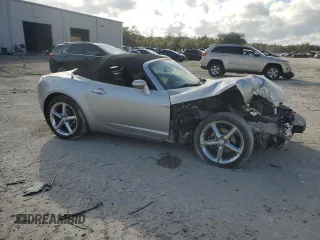 2009 Saturn Sky Red Line z VIN 1G8MT35X69Y104310, wystawiony jako Copart lot #87369754 z przebiegiem 62 428 mil mil oraz Szkody całkowita. Historia ofert i sprzedaży dostępna na DreamBid. Obrazek 4.