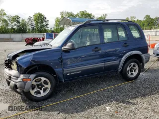 2002 Chevrolet Tracker ZR2 z VIN 2CNBJ734426936514, wystawiony jako Copart lot #54051825 z przebiegiem 229 668 mil mil oraz Szkoda całkowita • Salvage title. Historia ofert i sprzedaży dostępna na DreamBid. Obrazek 1.