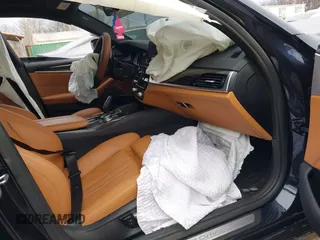 2018 BMW 5 Series 530e with VIN WBAJA9C51JB252601, listed as a IAAI auction lot 41491422 with 35,148 mi miles and . Bid and sale history available at DreamBid. Image 5.