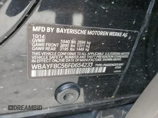 2015 BMW 7 Series 750Li xDrive z VIN WBAYF8C56FD654233, wystawiony jako Copart lot #83321604 z przebiegiem Nie podano mil oraz Nie do naprawy • Non repairable. Historia ofert i sprzedaży dostępna na DreamBid. Obrazek 13.