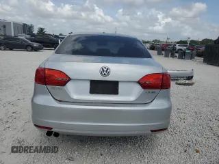 2013 Volkswagen Jetta SE z VIN 3VWDP7AJ8DM354734, wystawiony jako Copart lot #61147355 z przebiegiem 103 428 mil mil oraz Szkoda całkowita • Salvage title. Historia ofert i sprzedaży dostępna na DreamBid. Obrazek 6.