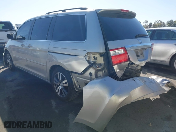 2005 Honda Odyssey TOURING with VIN 5FNRL38865B128519, listed as a IAAI auction lot 41830182 with 171,010 mi miles. Bid and sale history available at carsss.com. Image 3.