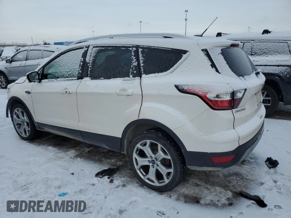 2017 Ford Escape Titanium with VIN 1FMCU9JD0HUE33552, listed as a Copart auction lot 45757535 with 59,628 mi miles and Clean Title. Bid and sale history available at carsss.com. Image 2.