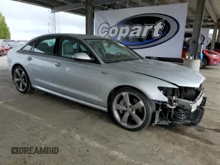 2014 Audi A6 Prestige z VIN WAUHGAFC1EN143102, wystawiony jako Copart lot #53692145 z przebiegiem 101 503 mil mil oraz Szkoda całkowita • Salvage title. Historia ofert i sprzedaży dostępna na DreamBid. Obrazek 4.