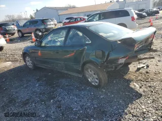 1999 Honda Civic DX with VIN 1HGEJ6229XL059370, listed as a Copart auction lot 86698214 with 0 mi miles and Salvage Title. Bid and sale history available at carsss.com. Image 2.