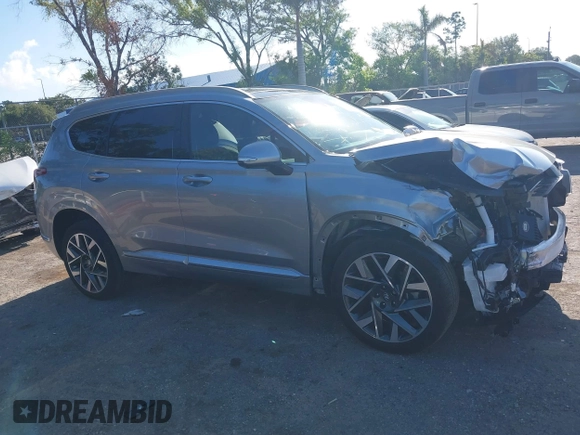 2023 Hyundai Santa Fe Calligraphy with VIN 5NMS54AL2PH560512, listed as a IAAI auction lot 39492126 with 6,379 mi miles and . Bid and sale history available at DreamBid. Image 14.