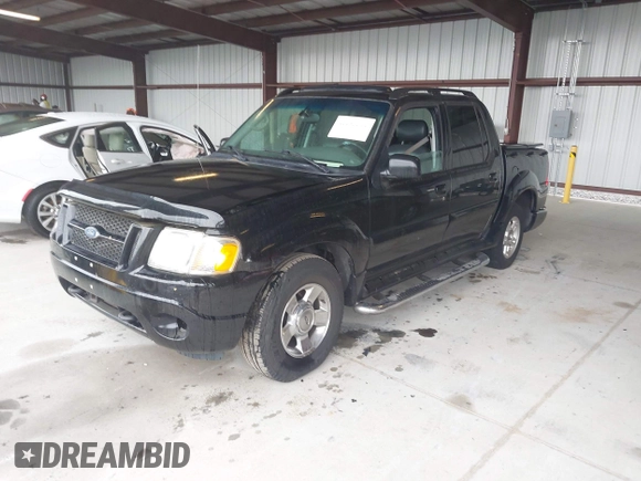 2004 Ford Explorer Sport Trac XLS z VIN 1FMZU77K94UA82414, wystawiony jako IAAI lot #42253012 z przebiegiem 202 018 mil mil oraz . Historia ofert i sprzedaży dostępna na DreamBid. Obrazek 2.