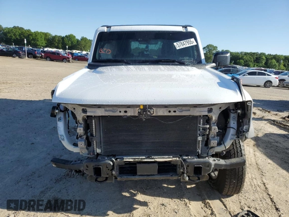 2023 Ford Bronco z VIN 1FMEE5BP7PLC16799, wystawiony jako Copart lot #57847955 z przebiegiem 11 980 mil mil oraz Czysty tytuł • Clean title. Historia ofert i sprzedaży dostępna na DreamBid. Obrazek 5.