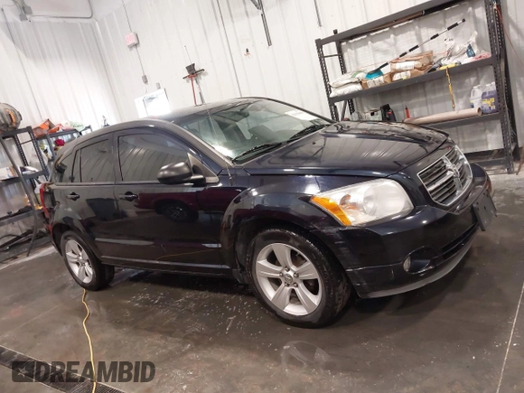 2011 Dodge Caliber Mainstreet with VIN 1B3CB3HA2BD148279, listed as a IAAI auction lot 42150488 with 131,278 mi miles and . Bid and sale history available at DreamBid. Image 13.
