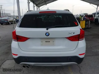 2015 BMW X1 sDrive28i with VIN WBAVM1C53FV318663, listed as a IAAI auction lot 41711526 with 182,204 mi miles. Bid and sale history available at carsss.com. Image 16.