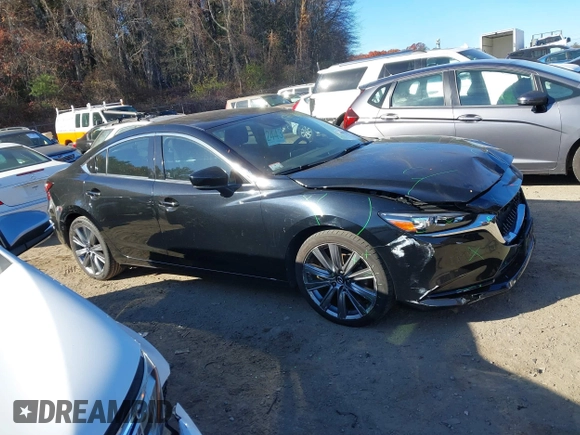 2018 Mazda 6 Grand Touring with VIN JM1GL1TY0J1319083, listed as a IAAI auction lot 40852818 with 57,408 mi miles and . Bid and sale history available at DreamBid. Image 13.