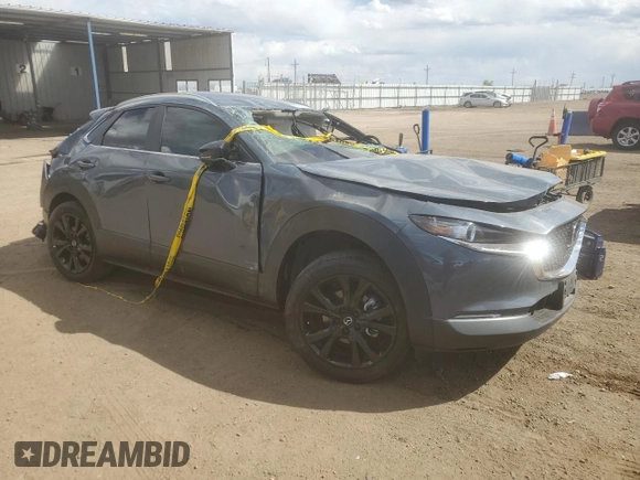2023 Mazda CX-30 2.5 S Carbon Edition with VIN 3MVDMBCM1PM578257, listed as a Copart auction lot 53824765 with 25,599 mi miles and Salvage Title. Bid and sale history available at carsss.com. Image 4.