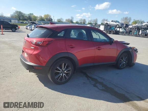 2017 Mazda CX-3 Touring z VIN JM1DKDC75H0170331, wystawiony jako Copart lot #51997455 z przebiegiem 141 405 mil mil oraz Szkoda całkowita • Salvage title. Historia ofert i sprzedaży dostępna na DreamBid. Obrazek 3.
