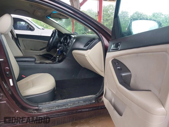 2015 Kia Optima LX with VIN 5XXGM4A70FG471577, listed as a IAAI auction lot 42440620 with 155,330 mi miles and . Bid and sale history available at DreamBid. Image 5.