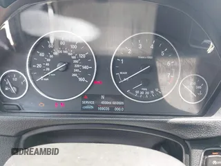 2014 BMW 3 Series 328i with VIN WBA3C1C52EK110753, listed as a IAAI auction lot 42444129 with 169,035 mi miles and . Bid and sale history available at DreamBid. Image 7.