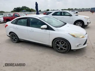 2013 Ford Focus SE with VIN 1FADP3F20DL289978, listed as a Copart auction lot 63350585 with 211,677 mi miles and Salvage title. Bid and sale history available at DreamBid. Image 4.