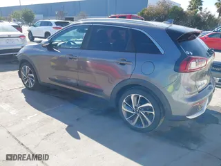 2017 Kia Niro Touring with VIN KNDCE3LC0H5051499, listed as a IAAI auction lot 41550176 with 82,592 mi miles. Bid and sale history available at carsss.com. Image 3.
