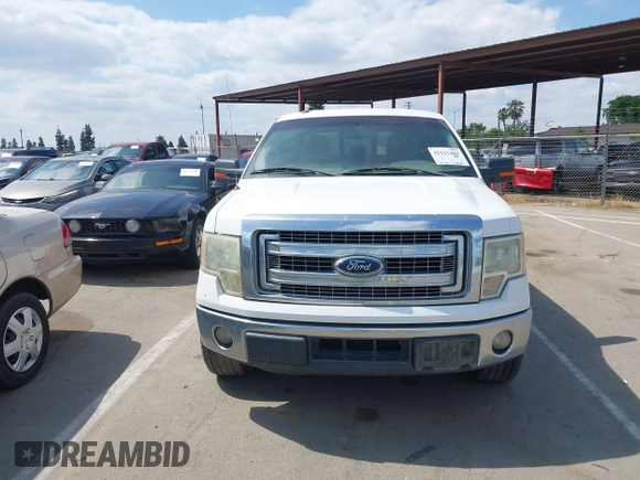 2014 Ford F-150 XL with VIN 1FTFW1CT8EKF55164, listed as a IAAI auction lot 42111483 with 233,166 mi miles. Bid and sale history available at carsss.com. Image 13.