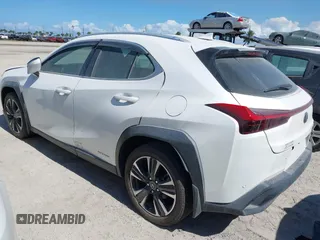 2021 Lexus UX with VIN JTHP9JBH4M2044900, listed as a IAAI auction lot 40543882 with 1 mi miles. Bid and sale history available at carsss.com. Image 3.