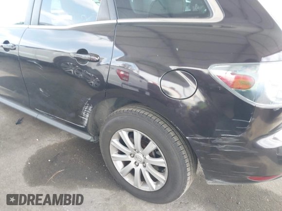 2011 Mazda CX-7 i Touring with VIN JM3ER2CM0B0402889, listed as a IAAI auction lot 42040829 with 134,836 mi miles. Bid and sale history available at carsss.com. Image 6.