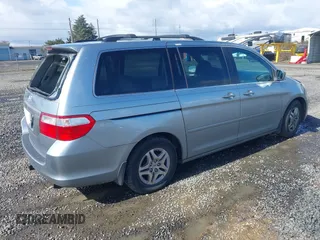 2007 Honda Odyssey EX with VIN 5FNRL38457B141956, listed as a IAAI auction lot 41818619 with 160,649 mi miles. Bid and sale history available at carsss.com. Image 4.