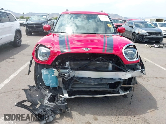 2023 MINI Countryman Cooper S z VIN WMZ53BR02P3R00984, wystawiony jako IAAI lot #42744505 z przebiegiem 27 432 mil mil oraz . Historia ofert i sprzedaży dostępna na DreamBid. Obrazek 6.