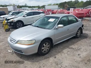 2002 Honda Accord EX z VIN 1HGCG56642A161161, wystawiony jako IAAI lot #41966381 z przebiegiem 258 103 mil mil oraz . Historia ofert i sprzedaży dostępna na DreamBid. Obrazek 2.