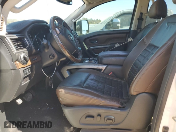 2016 Nissan Titan SL z VIN 1N6BA1F44GN514112, wystawiony jako Copart lot #48790075 z przebiegiem Nie podano mil oraz Szkoda całkowita • Salvage title. Historia ofert i sprzedaży dostępna na DreamBid. Obrazek 7.